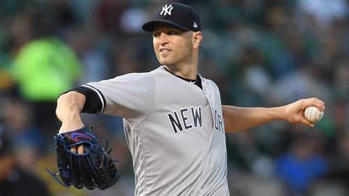 J.A. Happ of the New York Yankees pitches against the Oakland Athletics in the bottom of the first inning at Oakland Alameda Coliseum on September 4, 2018 in Oakland, California.  (Photo by Thearon W. Henderson/Getty Images)