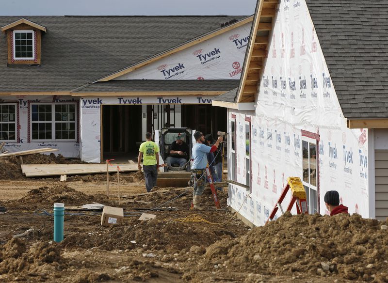 When the Federal Reserve raises short-term interest rates, it increases borrowing costs through the economy. Raise them significantly and purchases of homes would slow — as would construction. Dramatic hikes could mean job cuts and a fall in home values. (AJC file photo)