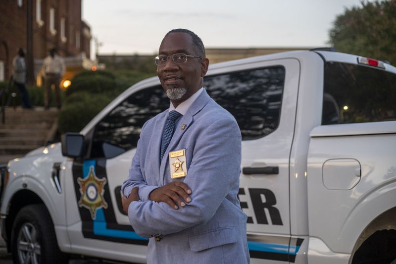 Dougherty County Coroner Michael Fowler was among local leaders in Albany who organized a procession of empty hearses incorporating victims' names. “It was bad,” he said. “We were trying to tell people to put the guns down.” (Alyssa Pointer/Alyssa.Pointer@ajc.com