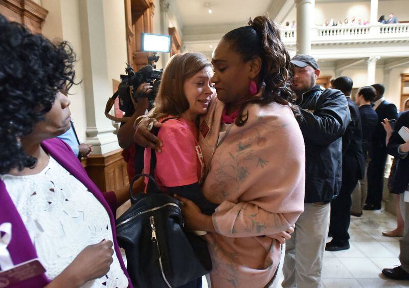 State Rep. Donna McLeod, D-Grayson (right) hugs Pro-Choice demonstrator after HB 481, anti-abortion ‘heartbeat’ bill, passed at the Georgia State Capitol on Friday, March 29, 2019. HYOSUB SHIN / HSHIN@AJC.COM