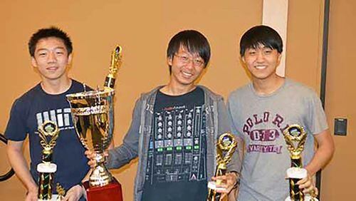 Gwinnett School of Math, Science and Technology math team members Timothy Gieseking (not pictured), Julius Tao, Jason Fan, and Albert Kim were named state math tournament champions.