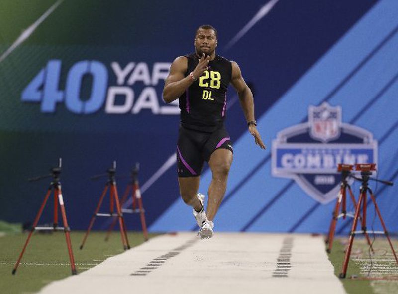 North Carolina State defensive lineman Bradley Chubb runs the 40-yard dash during the NFL football scouting combine, Sunday, March 4, 2018, in Indianapolis. (AP Photo/Darron Cummings)