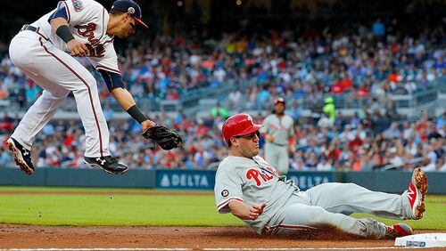 Braves rookie third baseman Rio Ruiz attempts to make a tag on the Phillies’ Maikel Franco in a June game at SunTrust Park.  (Photo by Kevin C. Cox/Getty Images)