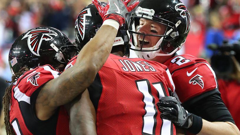 Quarterback Matt Ryan, wide receiver Julio Jones and running back Devonta Freeman are three big reasons the Falcons are a No. 2 seed in the NFC going going into the NFL playoffs, that begin this weekend. (Curtis Compton/ccompton@ajc.com)