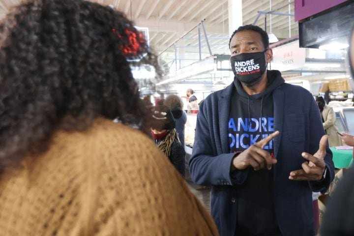 Atlanta mayoral candidate Andre Dickens talked through his campaign promises with market customer Mona Gilbert at a campaign stop at the Sweet Auburn Curb Market.
Saturday, November 20, 2021. Miguel Martinez for The Atlanta Journal-Constitution 