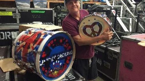 Rick Allen with some of his painted drum artwork.