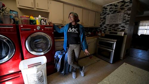 Forest Cove resident Lolita Evans is seen in the kitchen of her apartment Tuesday, Feb. 1, 2022. (Daniel Varnado/For the Atlanta Journal-Constitution)