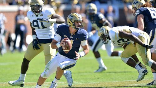 Pittsburgh Panthers quarterback Nathan Peterman (4) looks to pass in the second half at Bobby Dodd Stadium on Saturday, October 17, 2015. Pittsburgh Panthers won 31-28 over the Georgia Tech Yellow Jackets. HYOSUB SHIN / HSHIN@AJC.COM