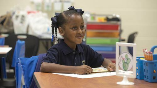 Roswell and the STAR House Foundation are seeking 24 new AmeriCorps members to work with students in an after-school program. AJC FILE