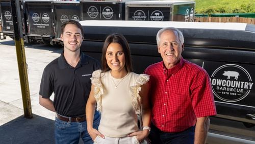 Bennett Brown IV (from left), his sister Jessica and father Bennett Brown III stand on the loading dock at LowCountry Barbecue in Smyrna. PHIL SKINNER FOR THE ATLANTA JOURNAL-CONSTITUTION