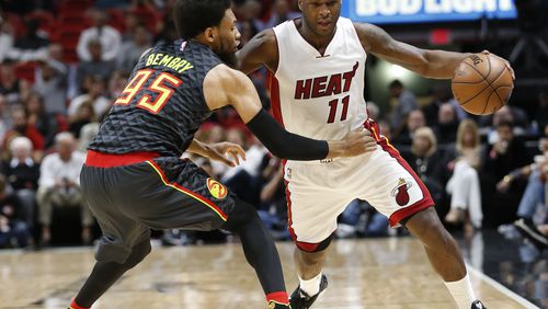 Miami Heat guard Dion Waiters (11) drives past Atlanta Hawks forward DeAndre Bembry (95) during the first half of an NBA basketball game, Wednesday, Feb. 1, 2017, in Miami. (AP Photo/Wilfredo Lee)