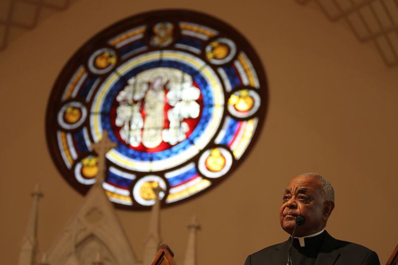 March 25, 2016 Atlanta - Archbishop Wilton D. Gregory gives the opening reflection for the 36th Annual Good Friday Pilgrimage at the Shrine of the Immaculate Conception Catholic Church. Attendants commemorated the stations of the cross along the pilgrimage and reflected on issues at every station. TAYLOR CARPENTER / TAYLOR.CARPENTER@AJC.COM
