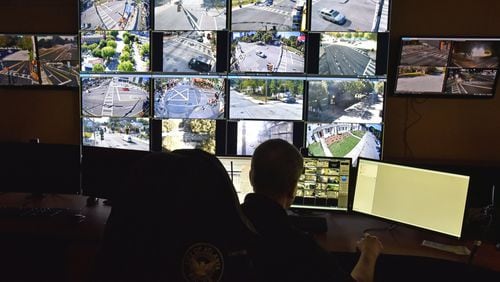 October 22, 2019 Atlanta - APD officer Charles Schiffbauer monitors surveillance cameras at Loudermilk Video Integration Center in Atlanta on Tuesday, October 22, 2019. If you’re in Atlanta, you’re probably on camera. Data from tech research firm Comparitech finds roughly 15 security cameras for every 1,000 residents, making us the only U.S. city to crack the top 10 in a study of the world’s most surveilled places. (Hyosub Shin / Hyosub.Shin@ajc.com)