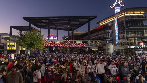 Braves fans gather in The Battery Atlanta outside Truist Park before Game 5 of the World Series. (Photo by Nathan Posner for the AJC)