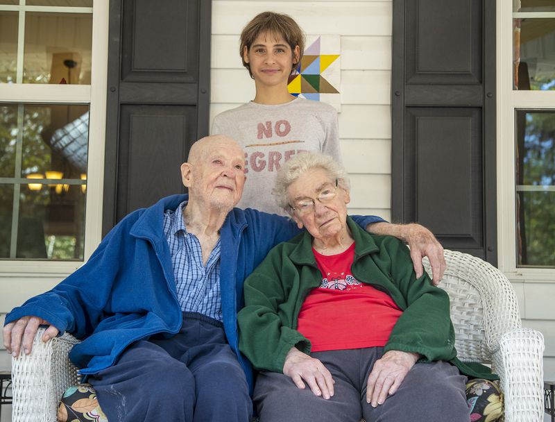 Alyssa Fiorino (center) is a live-in caretaker for her grandparents, Milton Forbes, 89, (left) and Marcia Forbes, 88, who live in Blairsville. Fiorino said that twice this year, she has taken her grandfather to medical appointments and found office staffers not wearing masks. (Alyssa Pointer / Alyssa.Pointer@ajc.com)