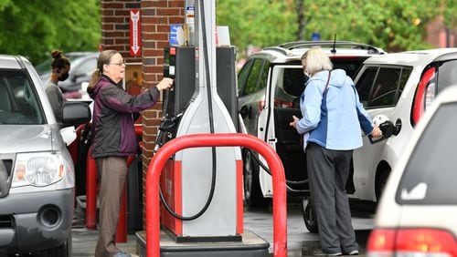 Customers wait their turn to fill up at Kroger Fuel Center in Decatur on Wednesday, May 12, 2021. Gas was one of the many things that cost more last year. Consumer prices in metro Atlanta rose 10% in 2021. (Hyosub Shin / Hyosub.Shin@ajc.com)