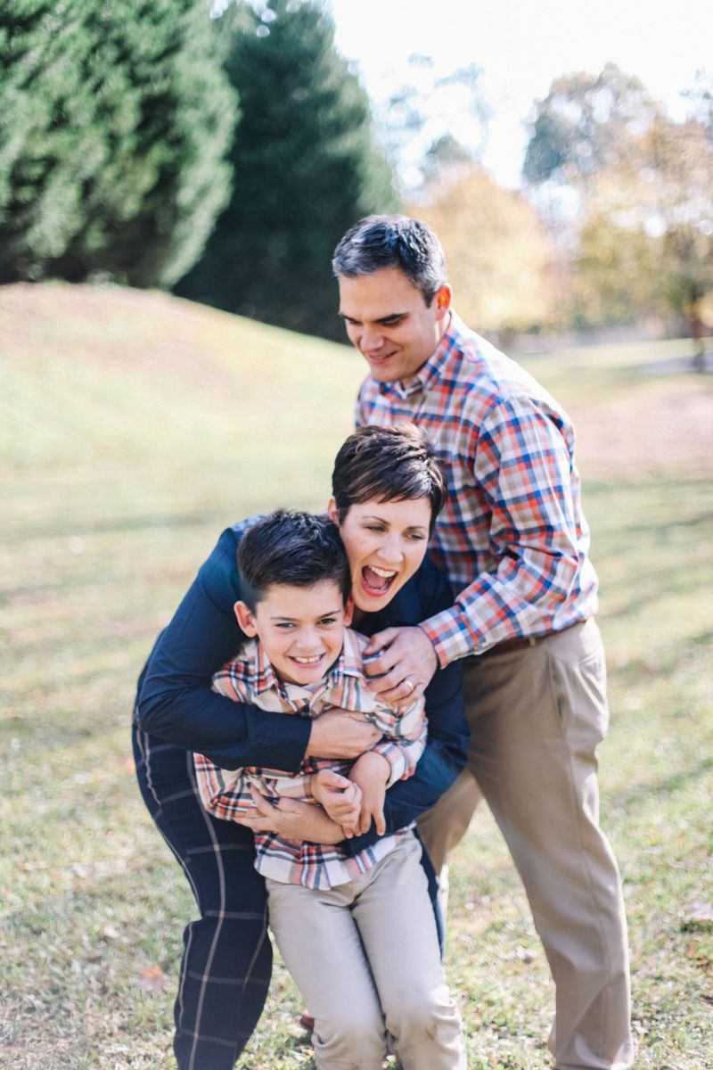 Comedian Heather Tolley-Bauer with her husband, Craig Bauer, and son, Reid, at their home in Marietta. CONTRIBUTED BY ANGELA ELLIOTT PHOTOGRAPHY