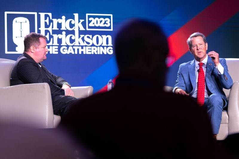 Gov. Brian Kemp (right) speaks to WSB radio host Erick Erickson at The Gathering conservative political conference in Buckhead on Friday, August 18, 2023. (Arvin Temkar / arvin.temkar@ajc.com)