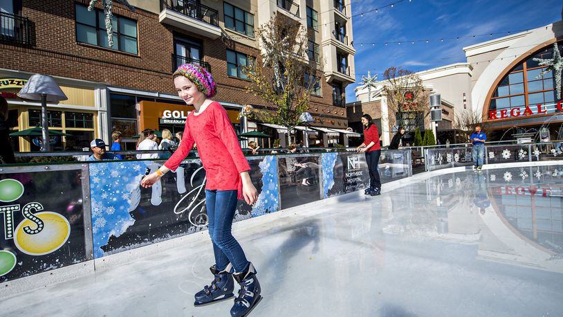Avalon, the big Alpharetta mixed-use development, maintained regular hours and operations Friday. In this 2015 photo, skaters enjoyed the ice rink at Avalon. JONATHAN PHILLIPS / SPECIAL
