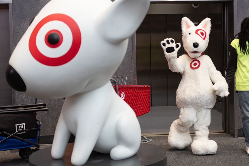 Target's mascot, Bullseye, waves to the crowd before the Shop With The Sheriff event at Target at Atlantic Station on Saturday, December 9, 2023. (Steve Schaefer/steve.schaefer@ajc.com)