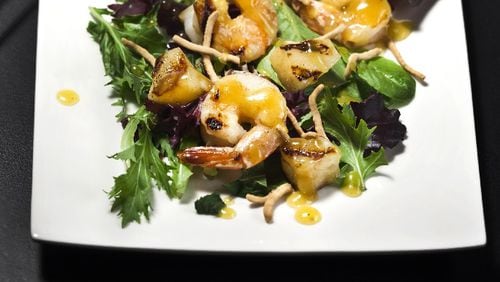 Toss grilled shrimp and pineapple into a summery salad, and break open the perfect bottle of wine to match. (Bill Hogan/Chicago Tribune/TNS)