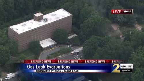 Residents of a southwest Atlanta high-rise building were evacuated Tuesday after construction crews damaged a nearby gas line, authorities said.