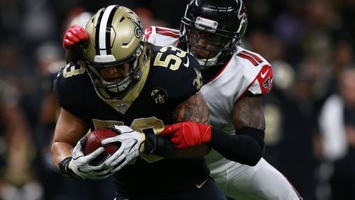 NEW ORLEANS, LOUISIANA - NOVEMBER 22: A.J. Klein #53 of the New Orleans Saints returns an interception as Julio Jones #11 of the Atlanta Falcons defends during the second half at the Mercedes-Benz Superdome on November 22, 2018 in New Orleans, Louisiana. (Photo by Sean Gardner/Getty Images)