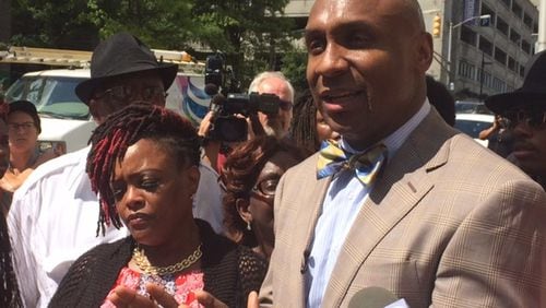 Alexia Christian’s mother, Felecia Christian, and her lawyer, Mawuli Davis, discuss the death of Alexia Christian. She was fatally shot by Atlanta police officers while under arrest in the back of a patrol car on April 30, 2015. Davis said the issue is not the police department’s official account but the lack of accountability and transparency. (Photo by Christian Boone/AJC)