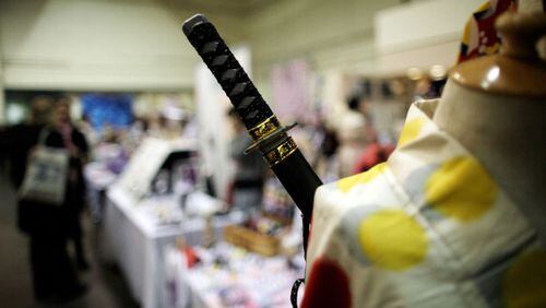 LONDON, ENGLAND - FEBRUARY 24:  A kimono and replica katana on display at a stand at the Hyper Japan 2012 Event at the Earls Court Exhibition Centre on February 24, 2012 in London, England. (Photo by Matthew Lloyd/Getty Images)