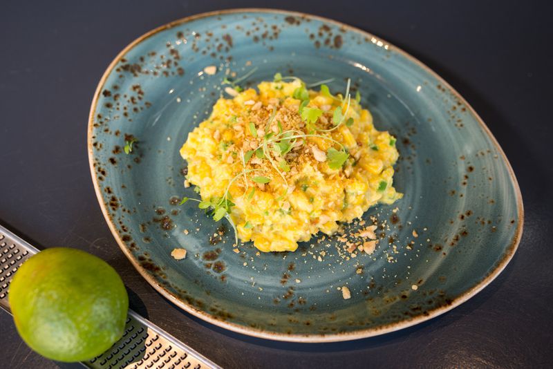 Coconut Creamed Corn With Jalapeno, Curry and Lime from chef Joey Ward of Gunshow. CONTRIBUTED BY MIA YAKEL