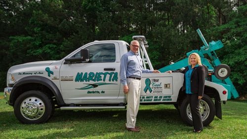 Family members and business owners for Marietta Wrecker Services have kicked off a campaign to raise awareness and educate the community about ovarian cancer, in partnership with the Georgia Ovarian Cancer Alliance. Contributed by Marietta Wrecker Service.