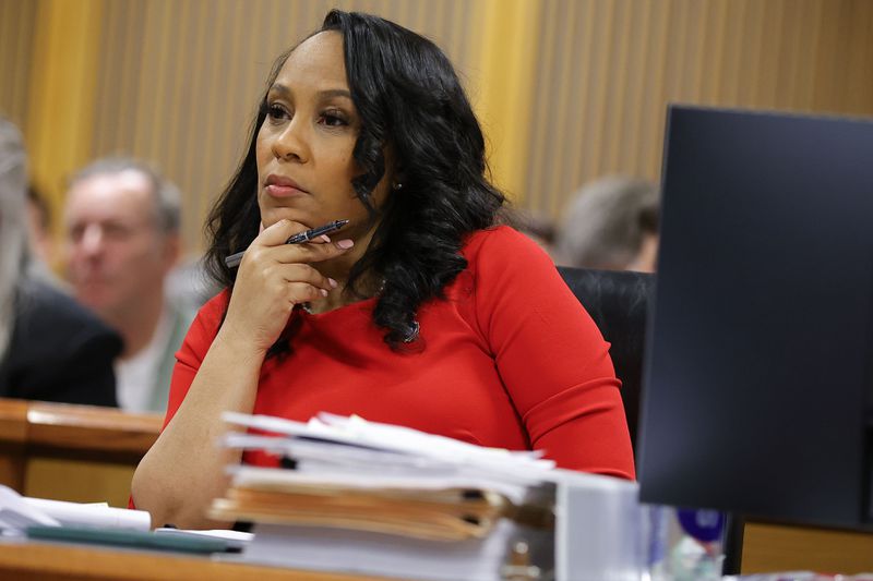 FILE - Fulton County District Attorney Fani Willis looks on during a hearing on the Georgia election interference case, Friday, March, 1, 2024, in Atlanta. (AP Photo/Alex Slitz, Pool, File)