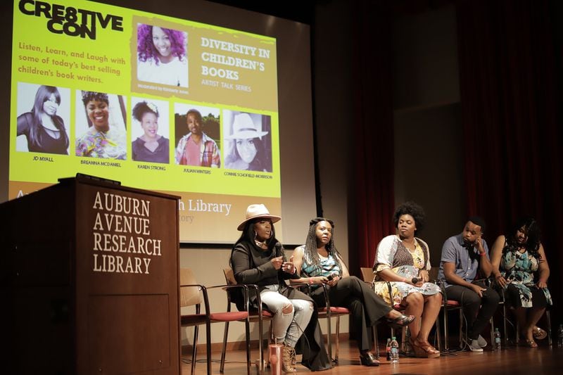 Authors are seated on stage during a Diversity in Children’s Books panel during the Cre8tiveCon event at the 2019 Black Writers Weekend in Atlanta. Contributed by AAMBC Inc.