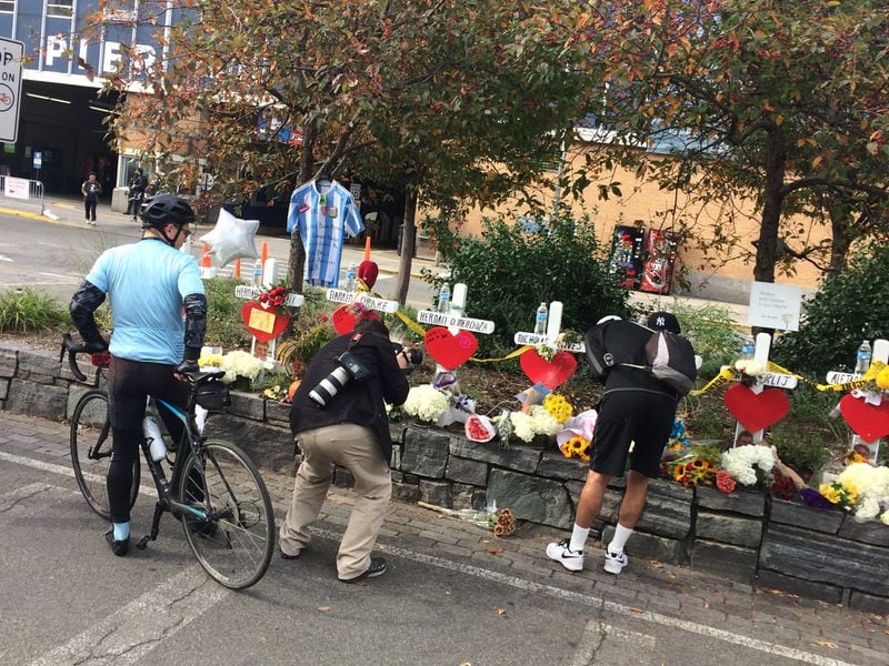 A memorial has sprung up on the New York street where a terrorist killed people using a rented truck earlier this week. Craig Schneider cschneider@ajc.com.