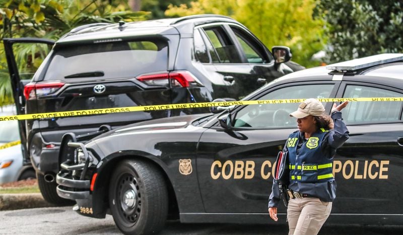 Cobb County police and GBI agents were focusing their efforts on a black Toyota RAV4, which was suspected in a series of vehicle break-ins Friday morning in the parking lot of the Rodeway Inn.