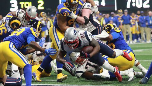 New England Patriots rookie running back Sony Michel (26) scores Super Bowl 53’s lone touchdown Sunday, Feb. 3, 2019, in the fourth quarter at Mercedes-Benz Stadium in Atlanta.
