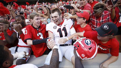 Bulldogs quarterback Jake Fromm is in the middle of a lot of  celebrations these days - this one after beating Tennessee at Neyland Stadium. (Joe Robbins/Getty Images)