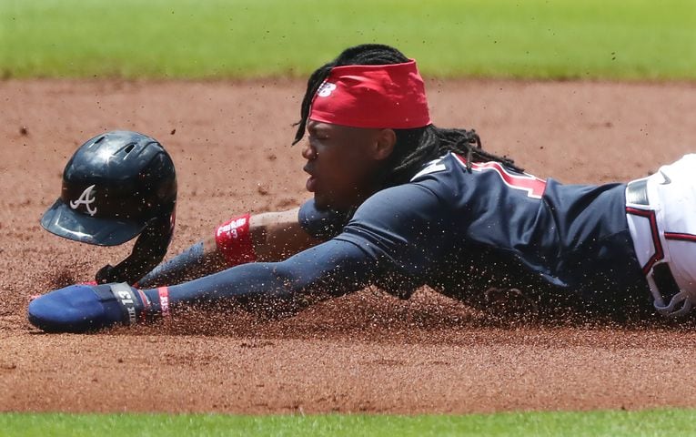 Braves' Ronald Acuna steals second base during the first inning of an intrasquad game on Thursday, July 16, 2020 in Atlanta.   Curtis Compton ccompton@ajc.com