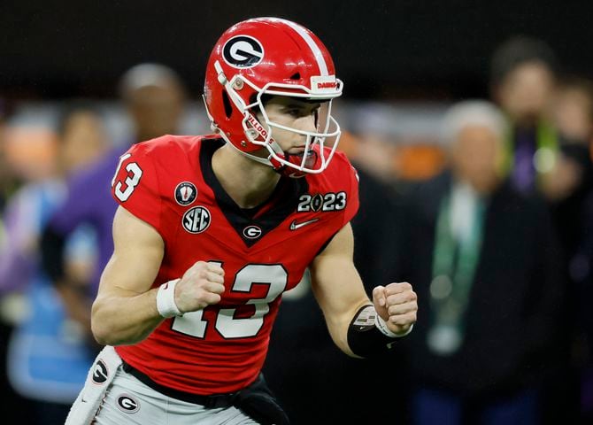Georgia Bulldogs quarterback Stetson Bennett (13) reacts against the TCU Horned Frogs during the first half of the College Football Playoff National Championship at SoFi Stadium in Los Angeles on Monday, January 9, 2023. (Jason Getz / Jason.Getz@ajc.com)