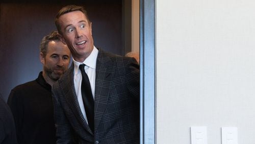 Former Falcons quarterback Matt Ryan appears surprised at the crowd gathered for his retirement announcement Monday at the franchise's headquarters in Flowery Branch.