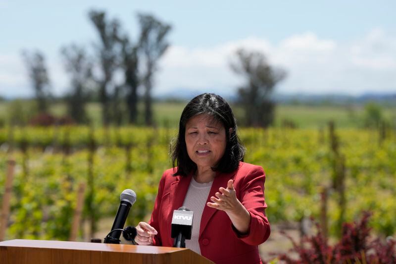 Acting United States Secretary of Labor Julie Su speaks at a news conference at Balletto Vineyards in Santa Rosa, Calif., Friday, April 26, 2024. Temporary farmworkers workers are getting more legal protections against employer retaliation, unsafe working conditions, illegal recruitment and other abuses. The rule announced Friday by the Biden administration aims to bolster support workers on H-2A visas. (AP Photo/Jeff Chiu)