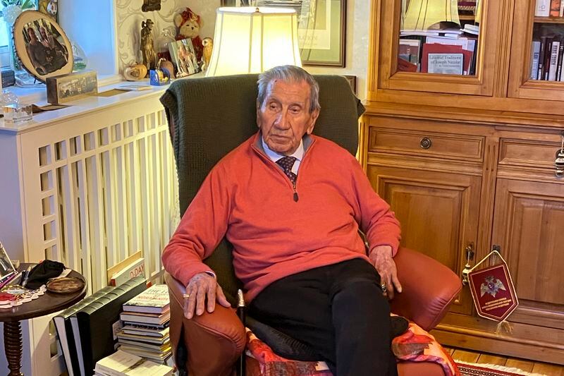 WWII veteran Charles Shay, is pictured at his home Sunday, March 24, 2024 in Bretteville-l'Orgueilleuse, Normandy. On D-Day, Charles Shay was a 19-year-old Native American army medic who was ready to give his life — and actually saved many. Now 99, he's spreading a message of peace with tireless dedication as he's about to take part in the 80th celebrations of the landings in Normandy that led to the liberation of France and Europe from Nazi Germany occupation. (AP Photo/Jeffrey Schaeffer)