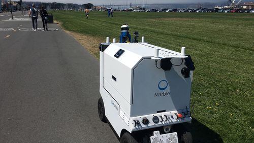 San Francisco-based robotics company Marble could be the first autonomous delivery device company to operate in Dallas. The city is considering a pilot. The robots, about the size of a motorized wheelchair, would travel at the maximum of 10 mph for 1 or 2 miles. They use sensors and cameras to detect and autonomously steer around obstacles such as cyclists, dogs and fire hydrants. For the pilot, however, the number of devices would be limited and a human would walk behind the device to monitor its safety. (Courtesy Marble)