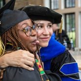 These two Oglethorpe University celebrate at the school's commencement on May 18, 2024. Photo Credit: Henry Bradley/Highlight Media.