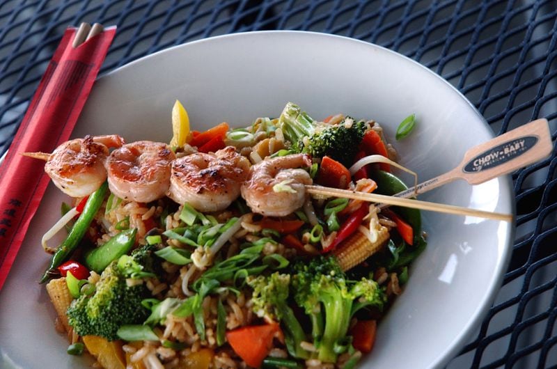  Stir fry veggies and shrimp over rice at Real Chow Baby. / AJC file photo