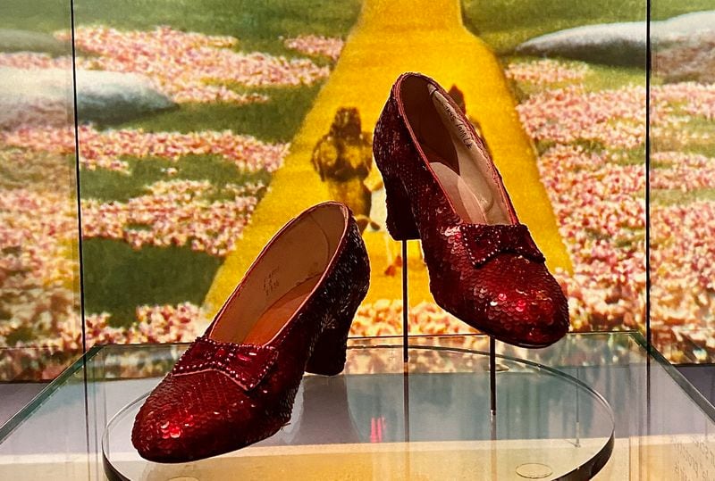 Several pairs of sequined red slippers were used in "The Wizard of Oz," but this is the pair featured in all the film's close-ups. (Suzanne Van Atten for The Atlanta Journal-Constitution)