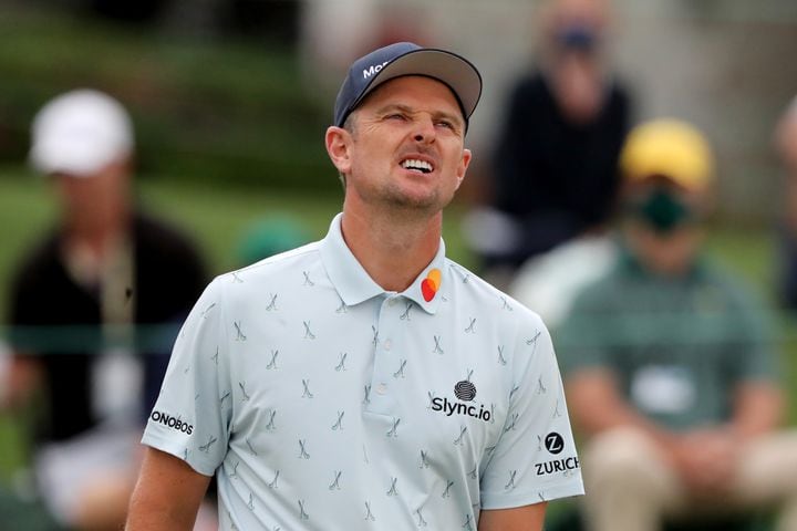 April 8, 2021, Augusta: Justin Rose reacts to missing his birdie attempt on the eighteenth hole during the first round of the Masters at Augusta National Golf Club on Thursday, April 8, 2021, in Augusta. Curtis Compton/ccompton@ajc.com
