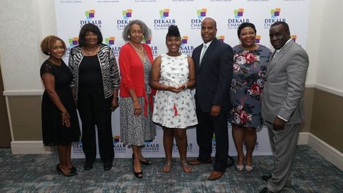 Temple Lester (center) received the DeKalb Chamber's Young Entrepreneur Award for her company Just Temple, which promotes science education through her STEM Swag Shop. Photo provided by the DeKalb Chamber of Commerce.