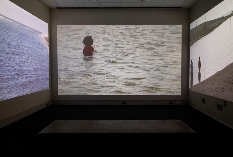An installation view of Sarah Cameron Sunde's three-channel video work "36.5 / North Sea," Katwijk aan Zee, The Netherlands, 2015, screening through October 18 at the Georgia Museum of Art. 
Courtesy of Georgia Museum of Art