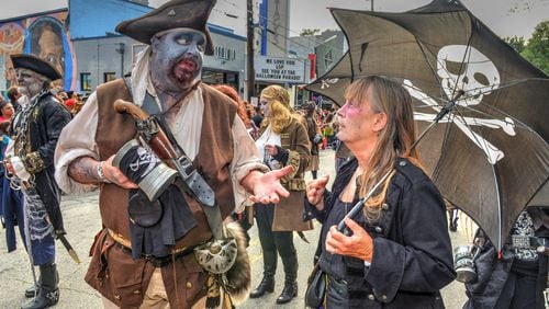 181020 Atlanta, Ga: Members of the Nocturnal Pirates have a serious discussion mid-parade. Photos from the 2018 (and 18th annual) Little Five Points Halloween Parade and Festival in Atlanta, Ga. on Saturday October 20, 2018. (Chris Hunt/Special) for use with 102218L5Pparade